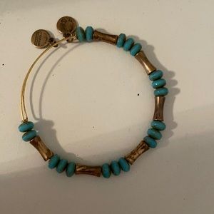 Gold and blue Alex and Ani bracelet